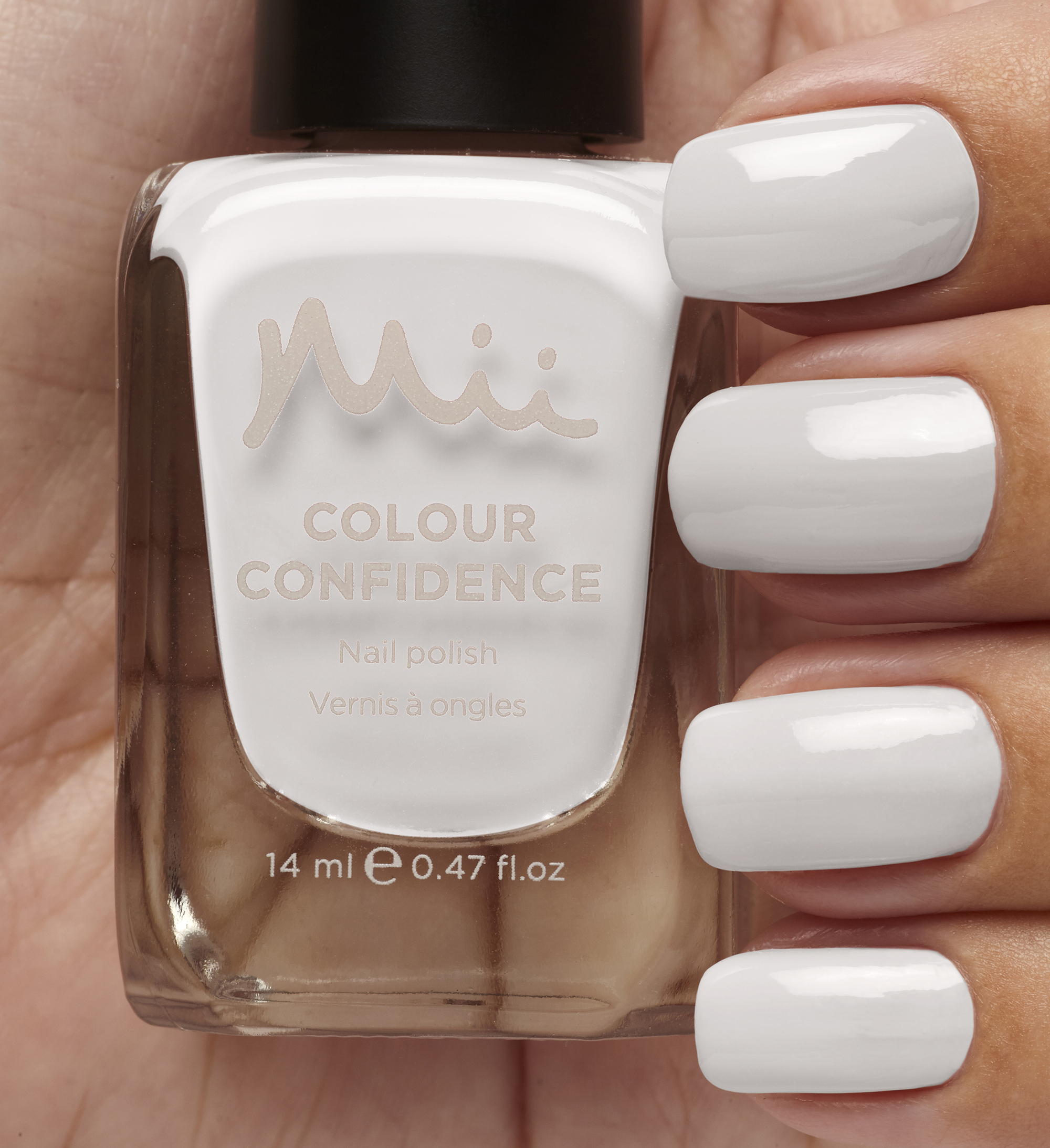 Model holding Meringue Kisses Colour Confidence Nail Polish