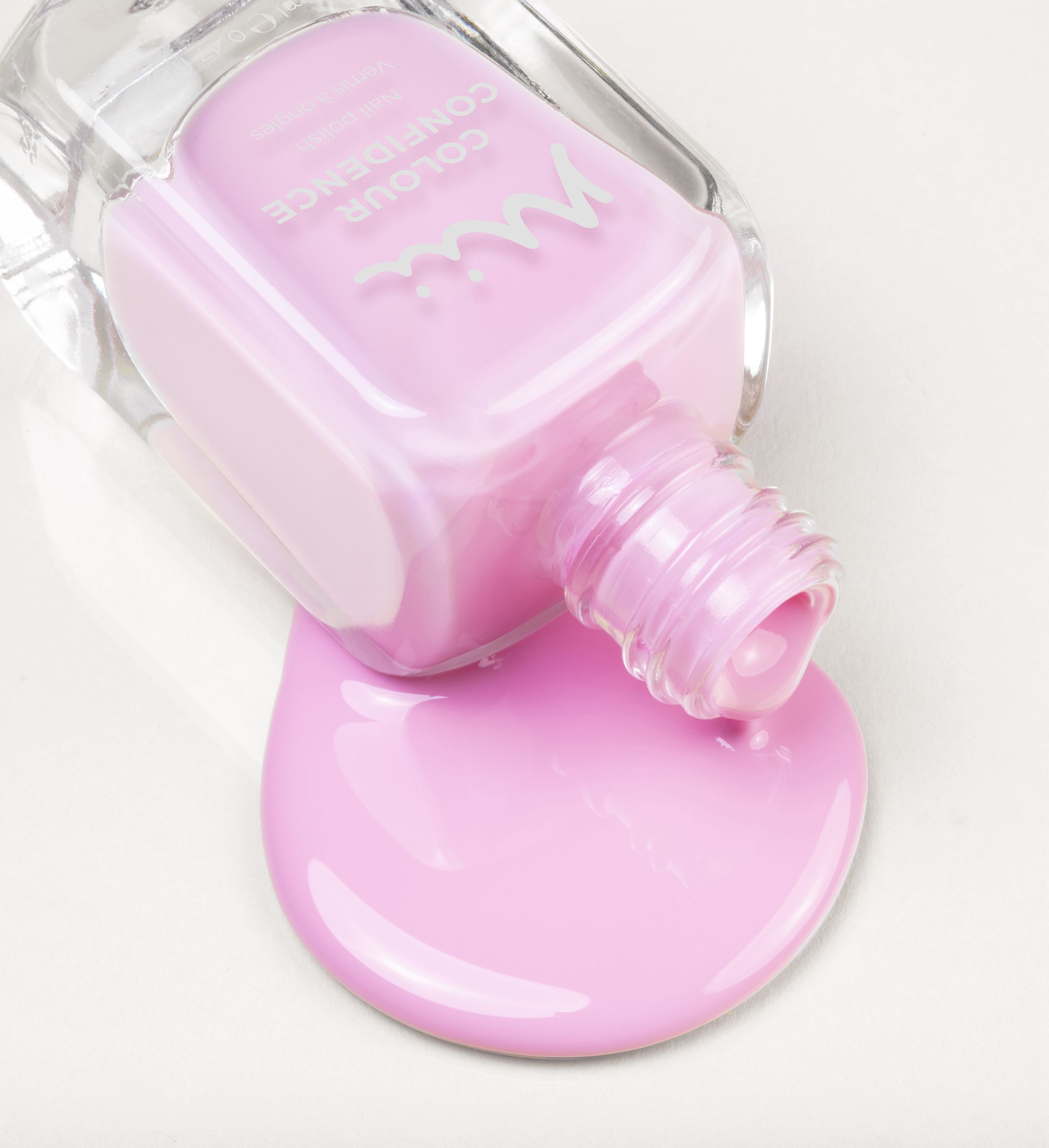 Colour Confidence Nail Polish Purity and Conservation spilling out of the bottle