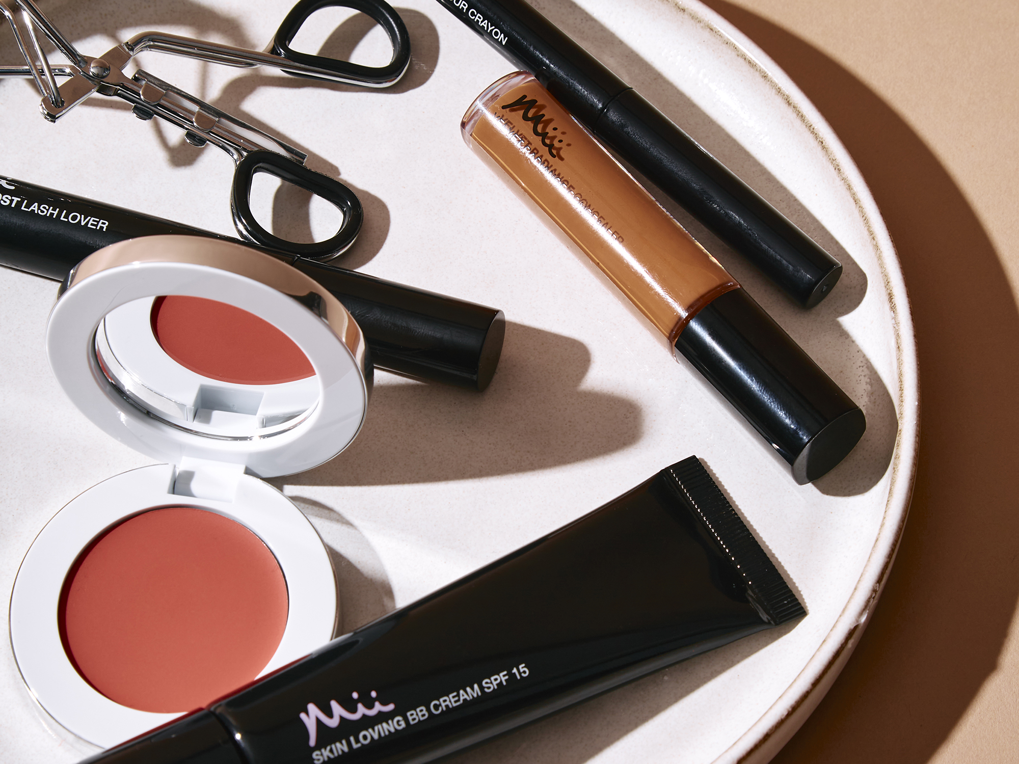 Group shot featuring Colour Wonder Lip Balm, Forever Eye Crayon, Skin Loving BB Cream, Velvet Radiance Concealer and Superboost Lash Lover Mascara