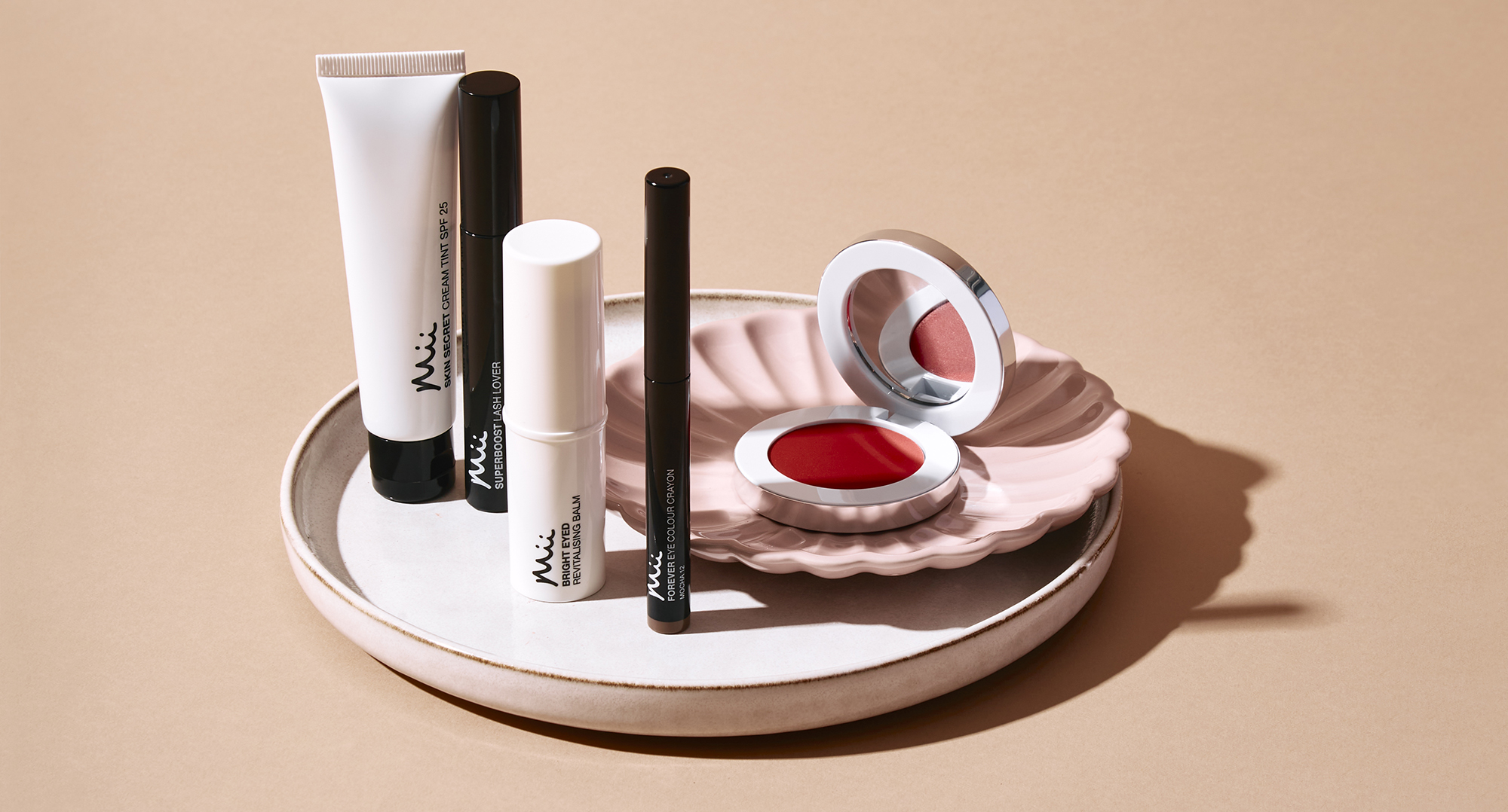 Group shot featuring Skin Secret Cream Tint, Colour Wonder Lip & Cheek Balm, Bright Eyed Revitalising Balm, Superboost Lash Lover Mascara and Forever Eye Crayon