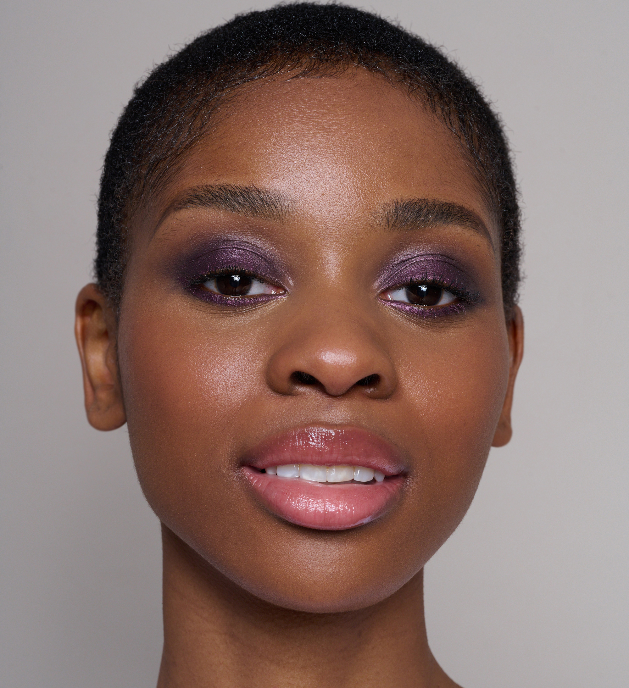 Model wearing Skin Loving BB Cream, Forever Eye Crayon Indigo and Amplifying Lash Lover Mascara