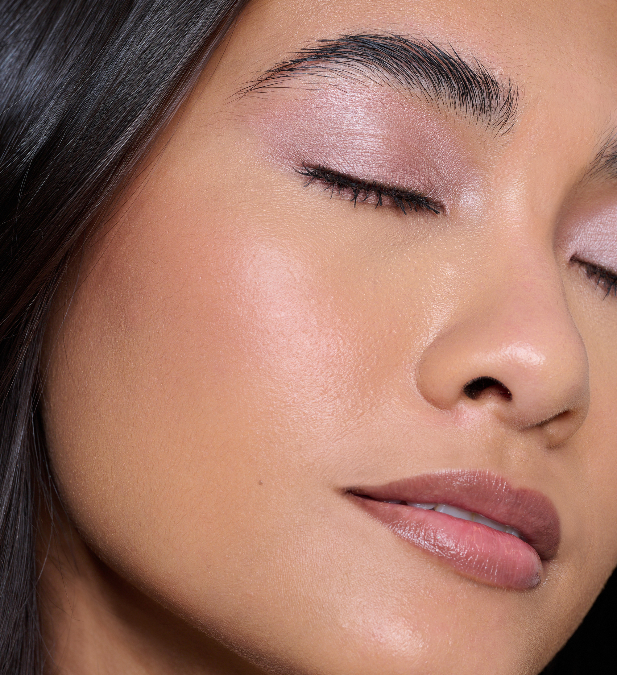 Model wearing Skin Loving BB Cream, Forever Eye Crayon Dusty Rose and Feature Length Lash Lover Mascara