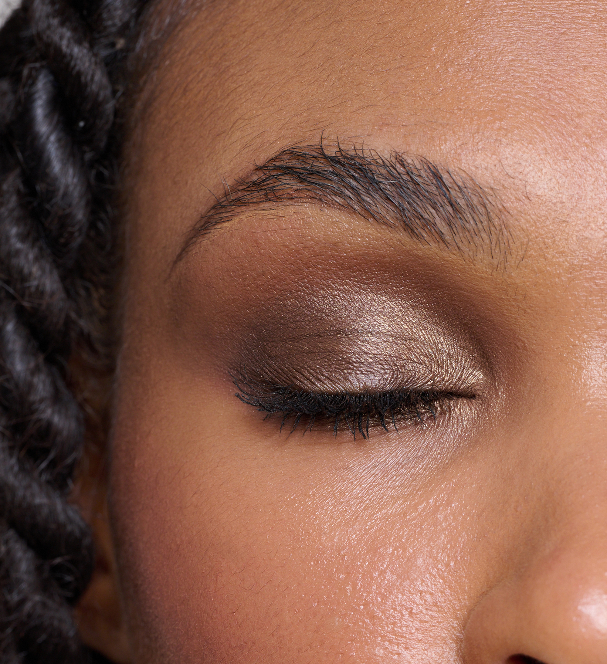 Model wearing Forever Eye Crayon Walnut and Intensifying Lash Lover Mascara