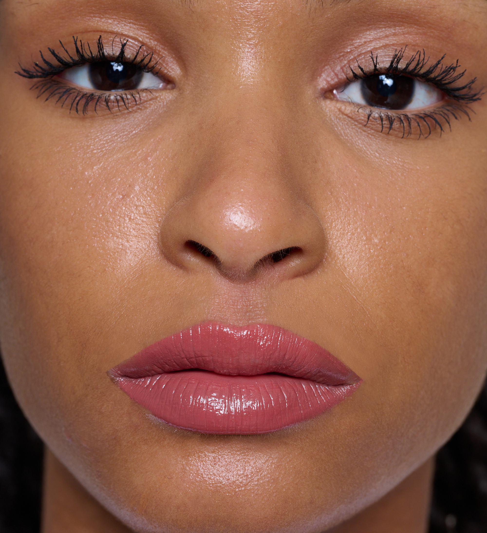 Model wearing Hydraboost Lip Lover Lipstick in Spiced