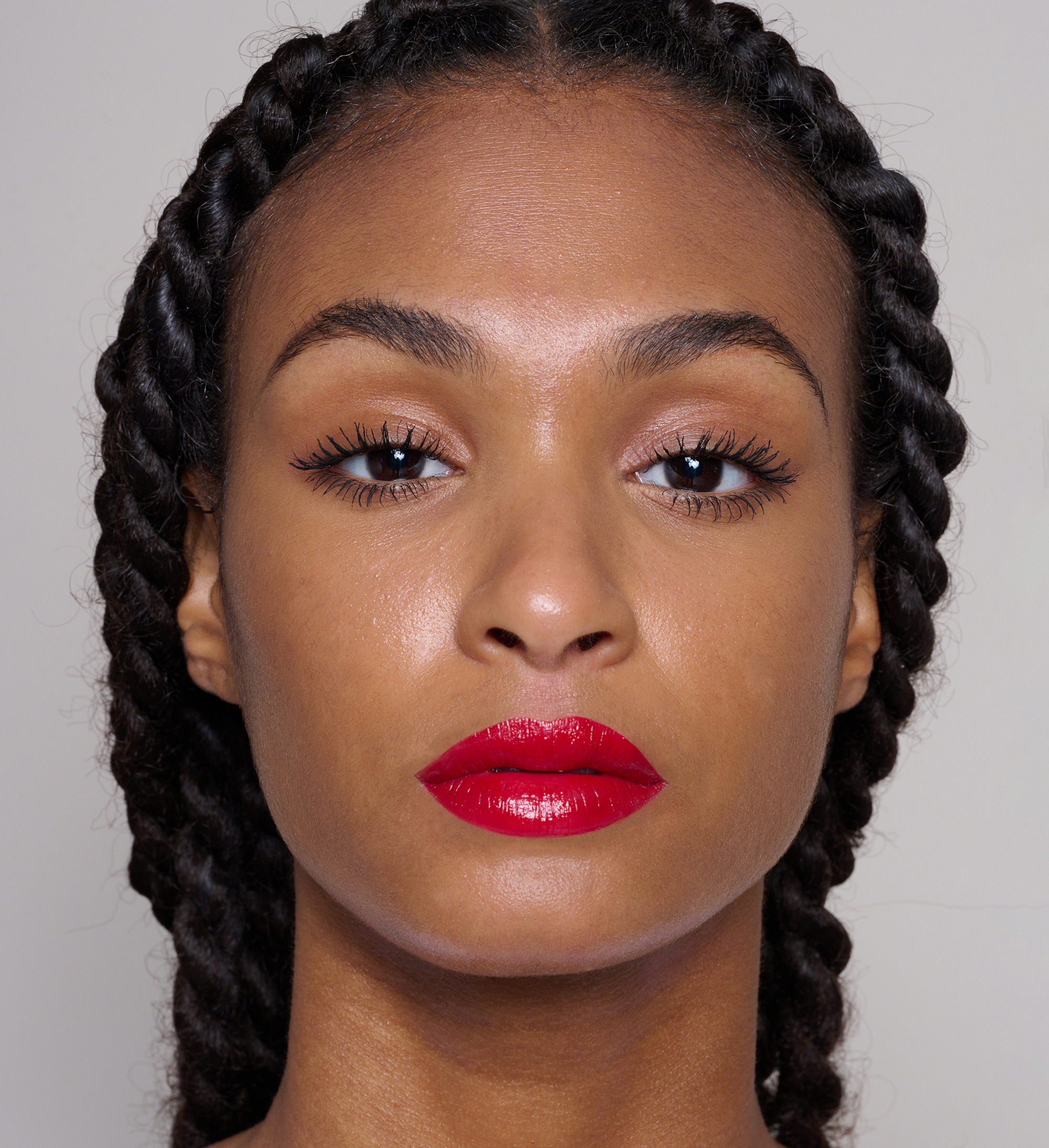 Model wearing Hydraboost Lip Lover Lipstick in Fireside