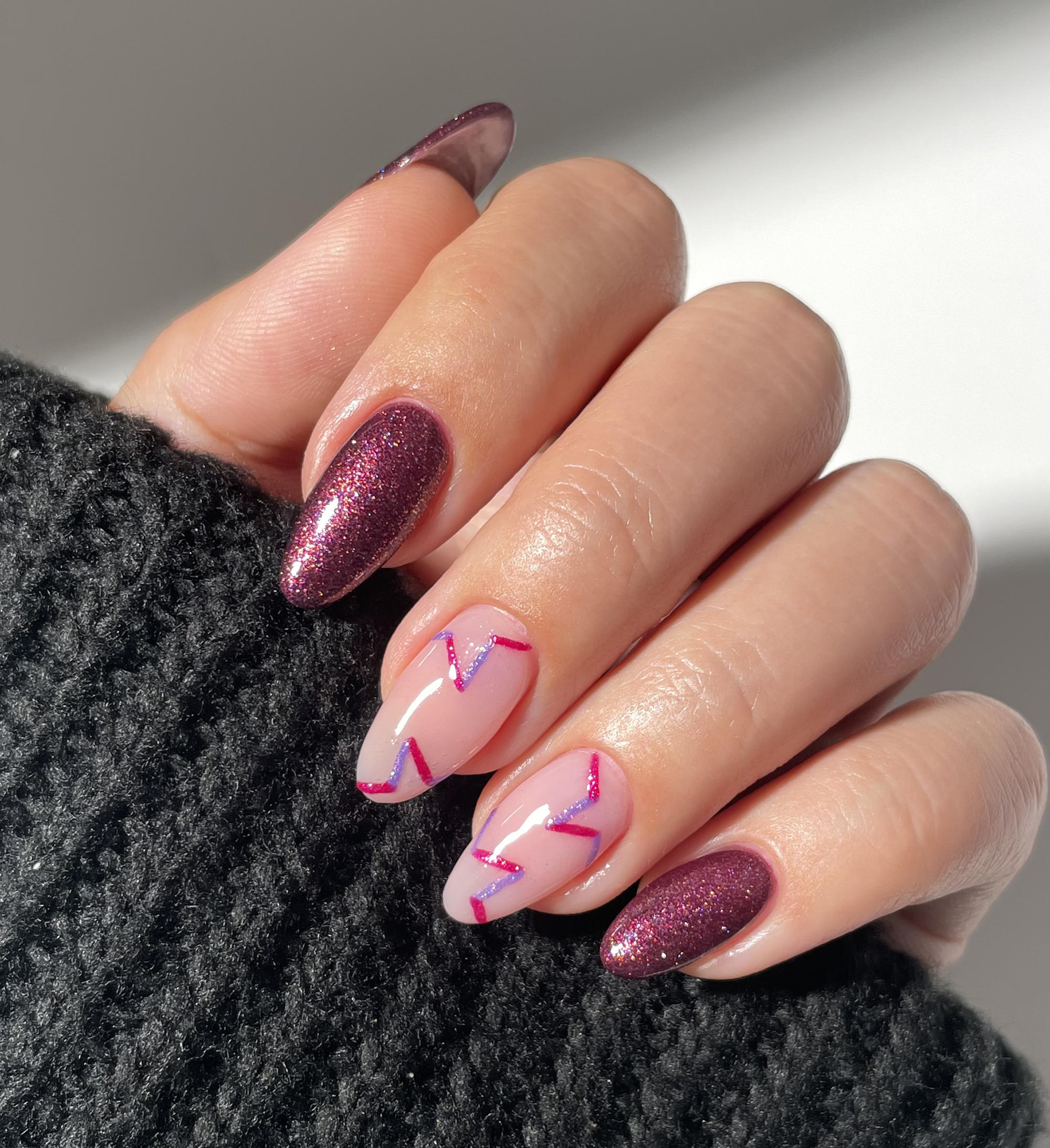 Model wearing nail polish nail art