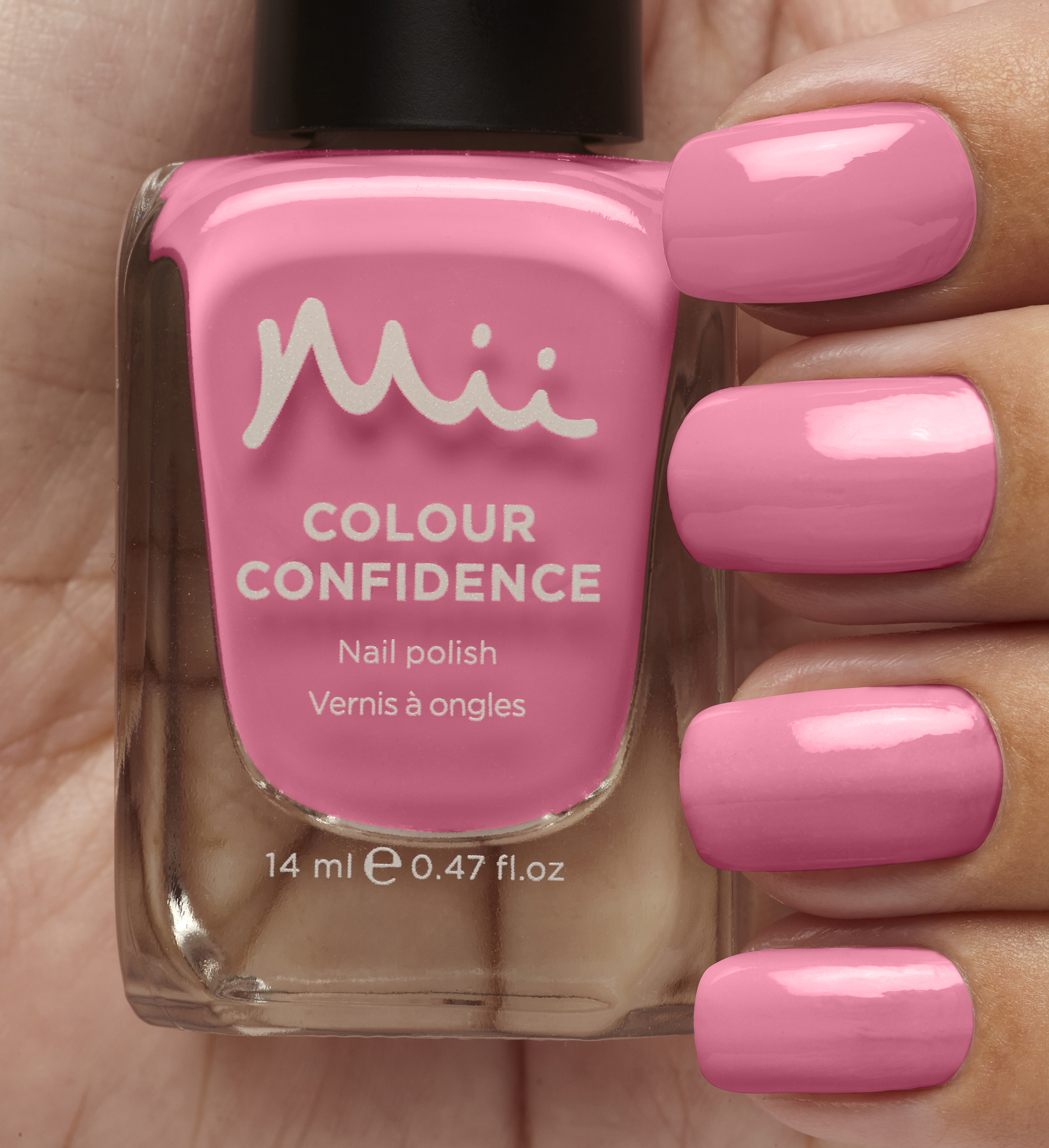 Model wearing and holding Colour Confidence Nail Polish Joie De Vivre