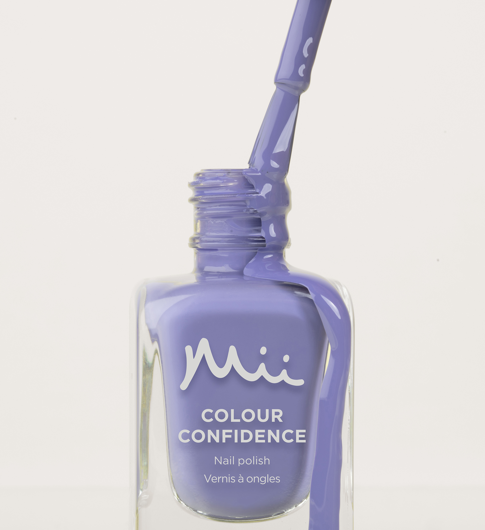 Colour Confidence Nail Polish One Planet One Love spilling out of the bottle
