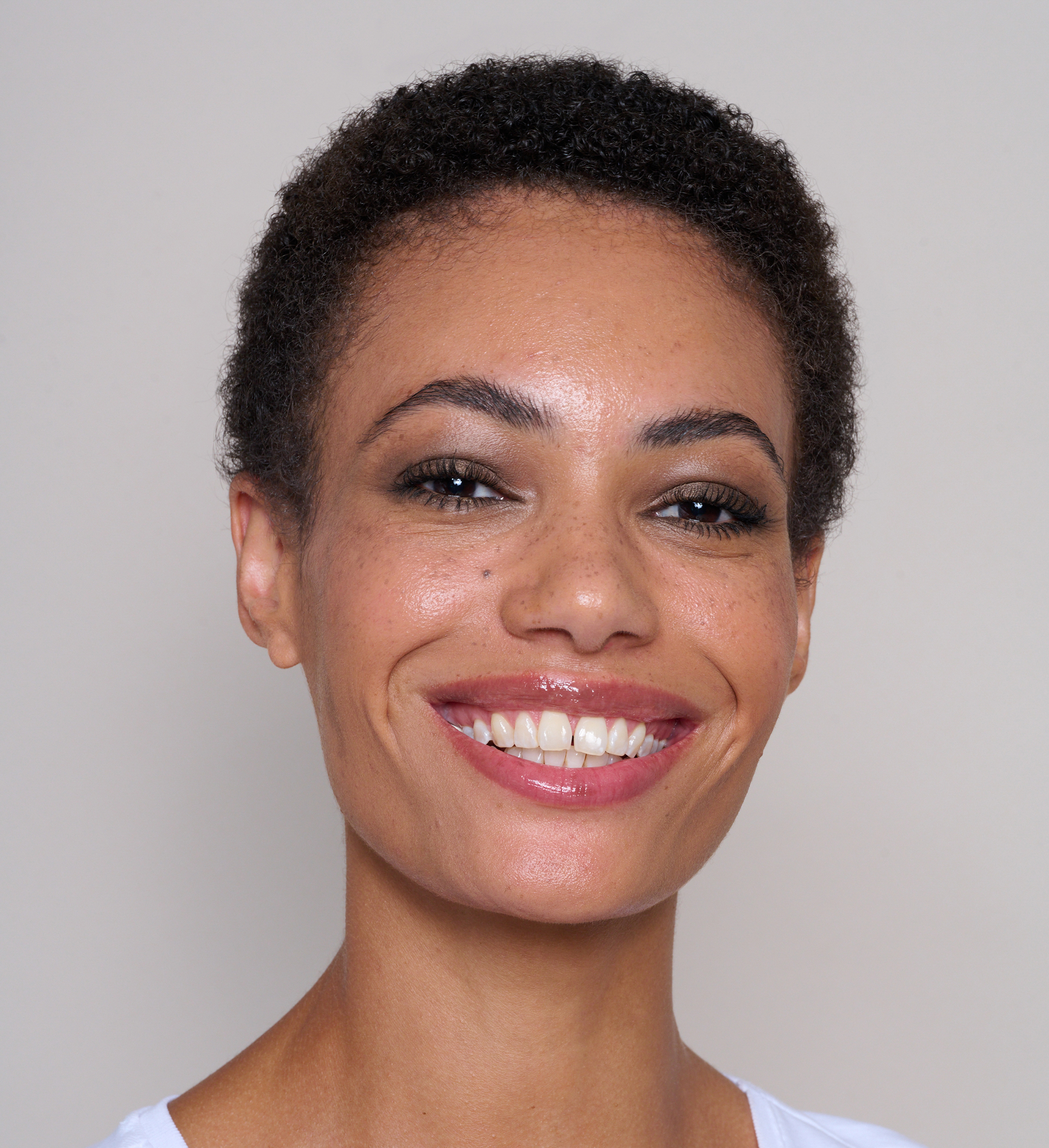 Model wearing Skin Secret Cream Tint, Forever Eye Crayon in Vintage and Showstopping Lash Lover Mascara