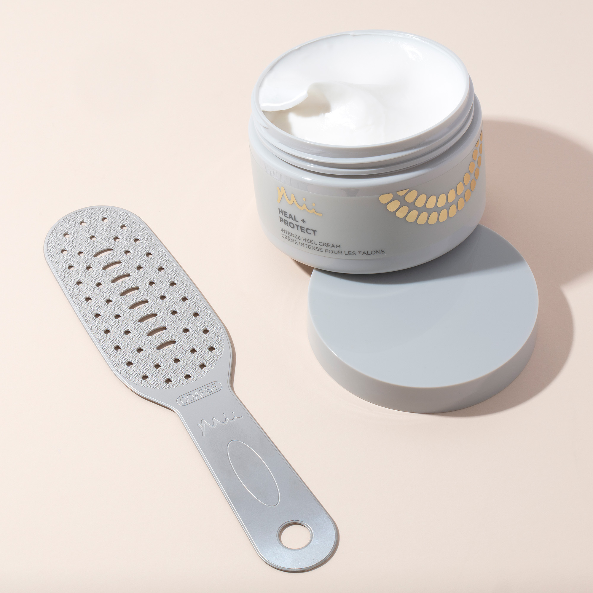 Group shot of Neat + Tidy Foot File and Heal + Protect Heel Cream