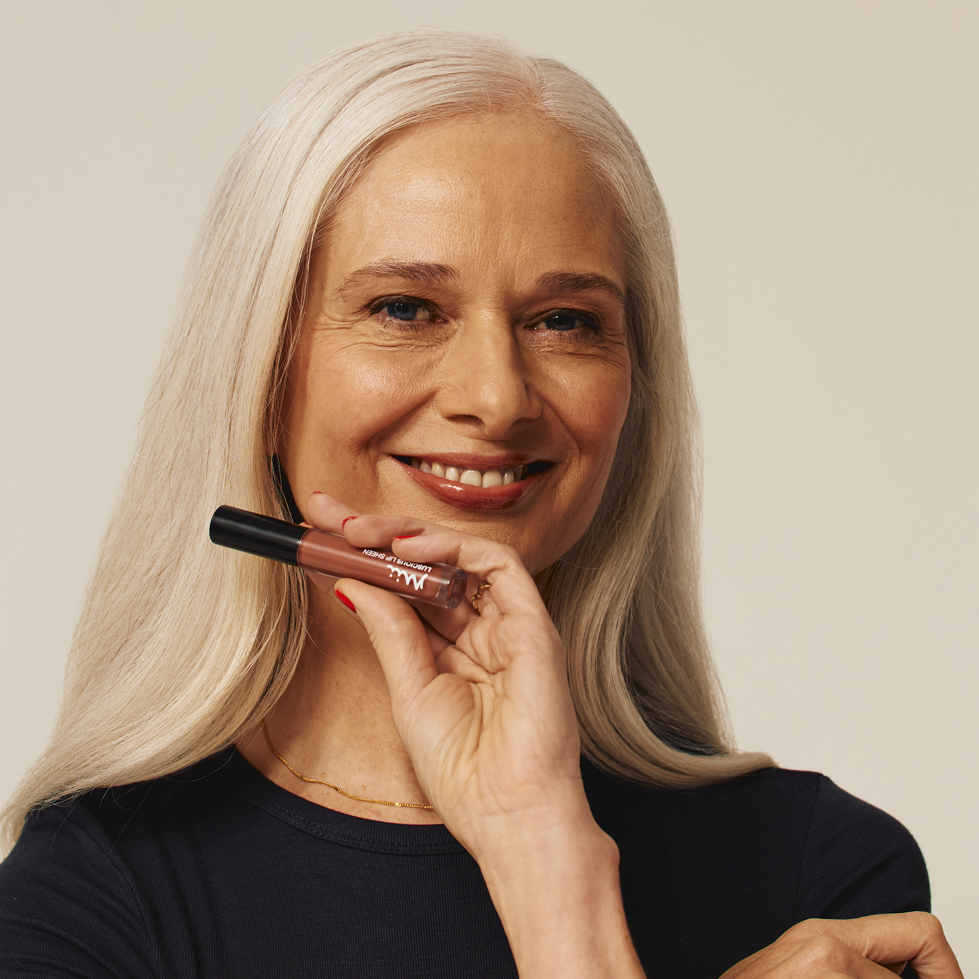 Model wearing Luscious Lip Sheen Lip Gloss in Foxy