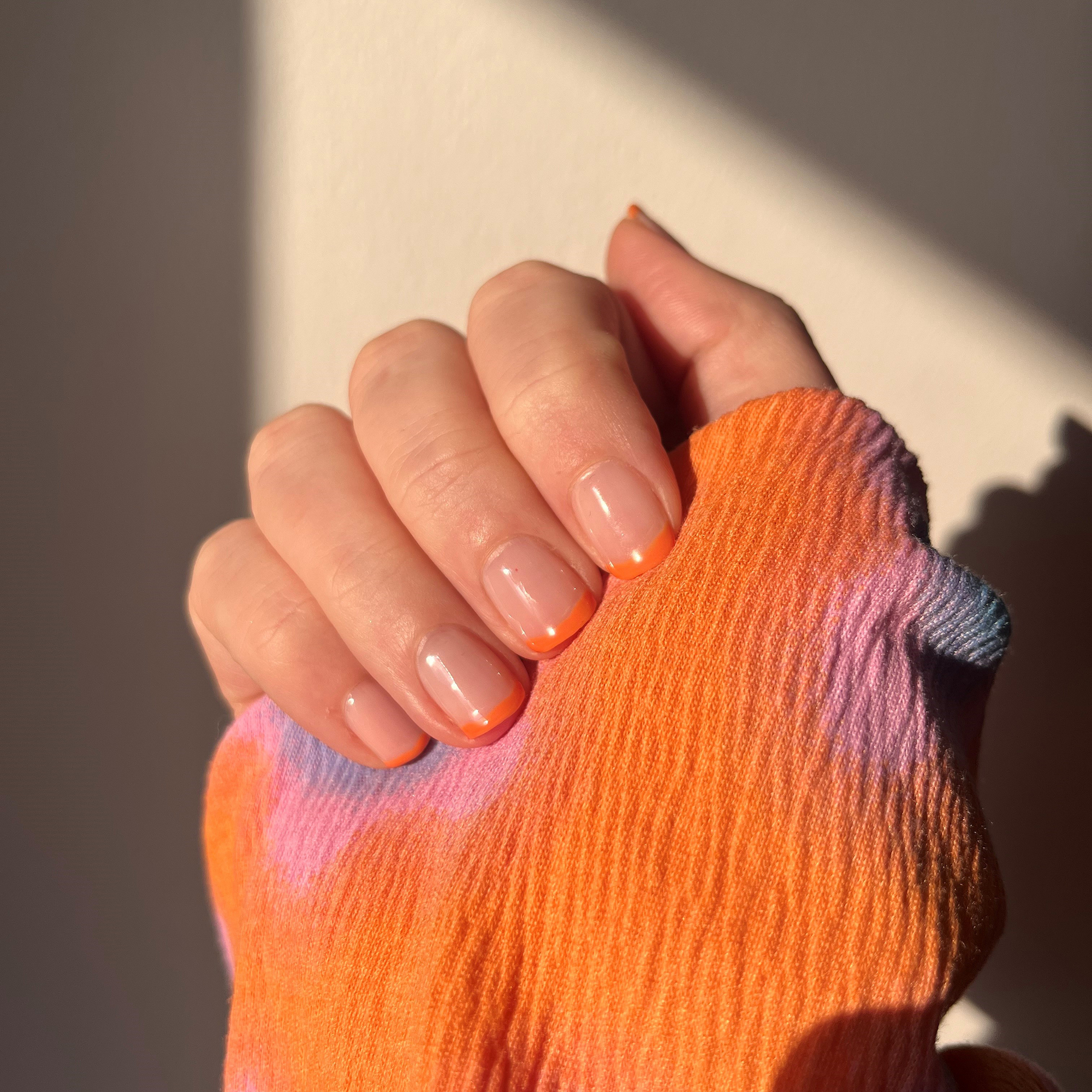 Model wearing Colour Confidence Nail Polish in Make Believe