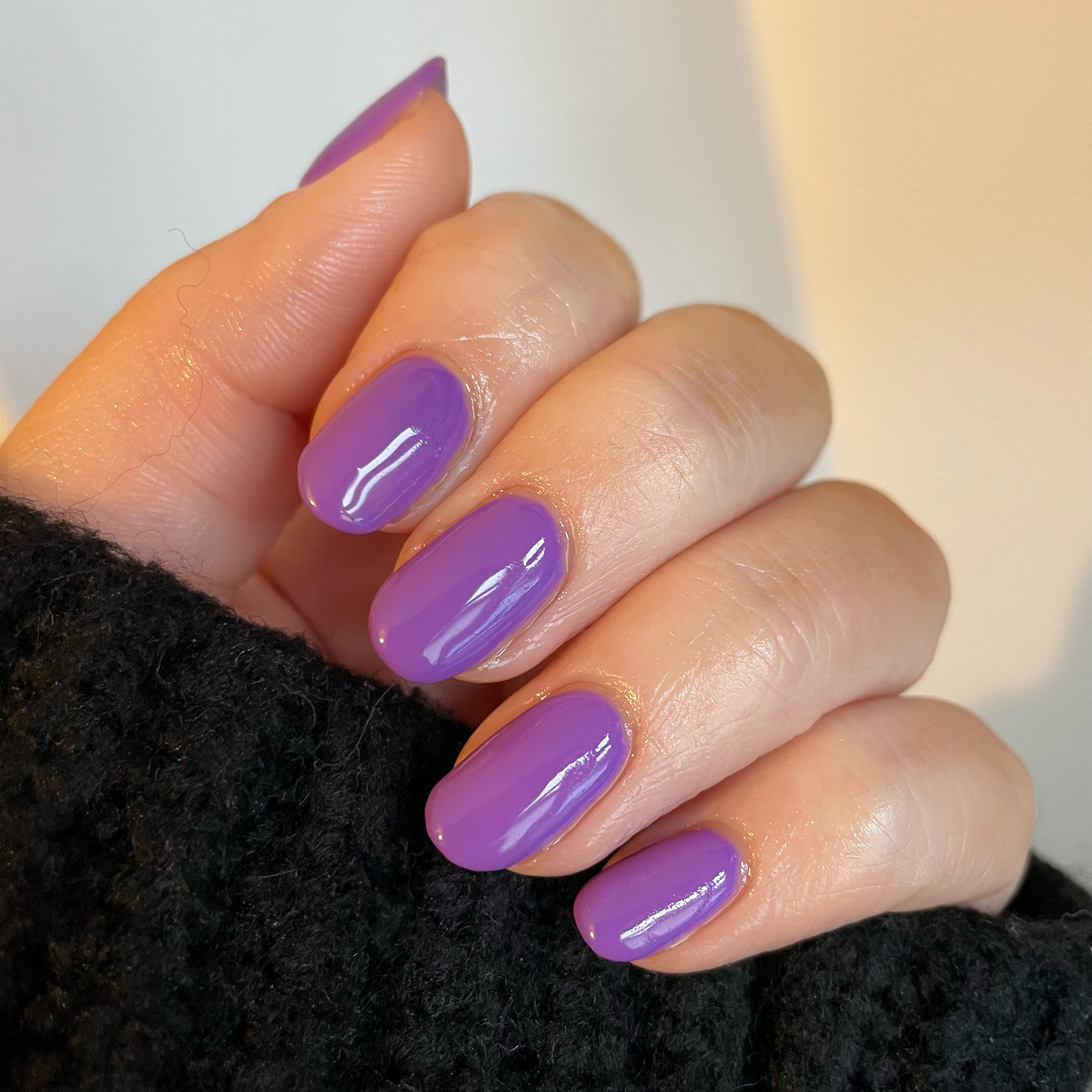 Model wearing Colour Confidence Nail Polish in Masquerade