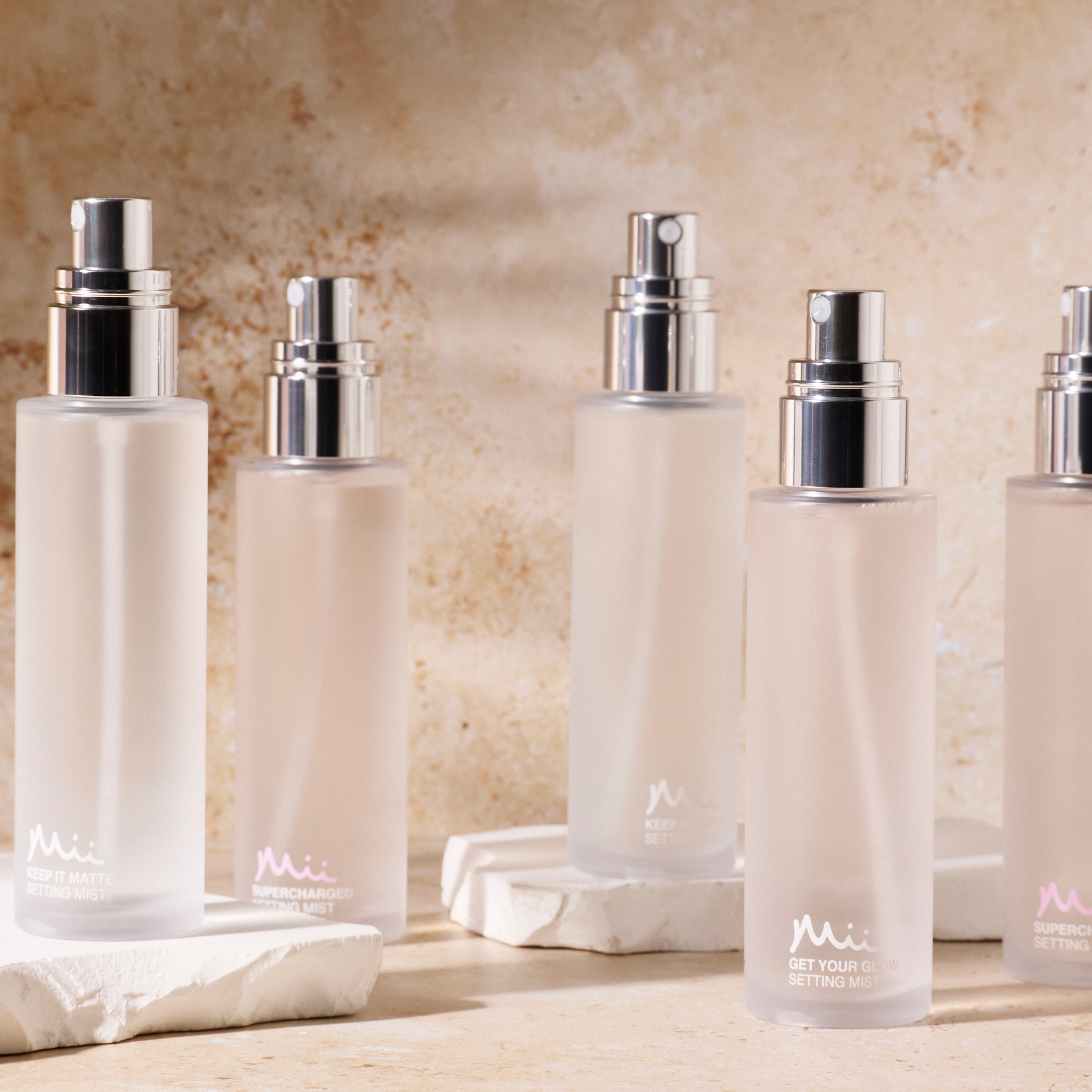 Group shot of Supercharged Setting Mist, Keep It Matte Setting Mist and Get Your Glow Setting Mist