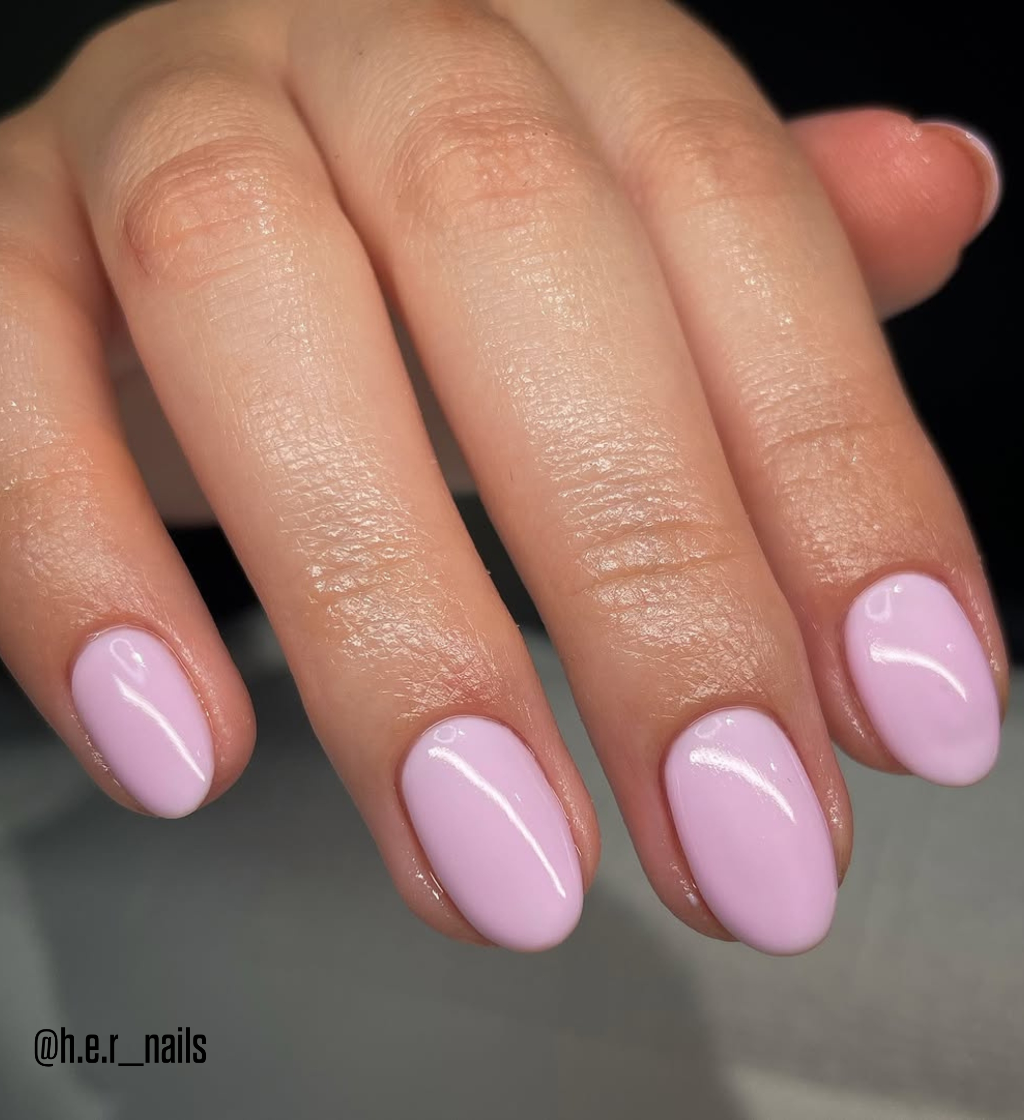 Model wearing Colour Confidence First Love nail polish