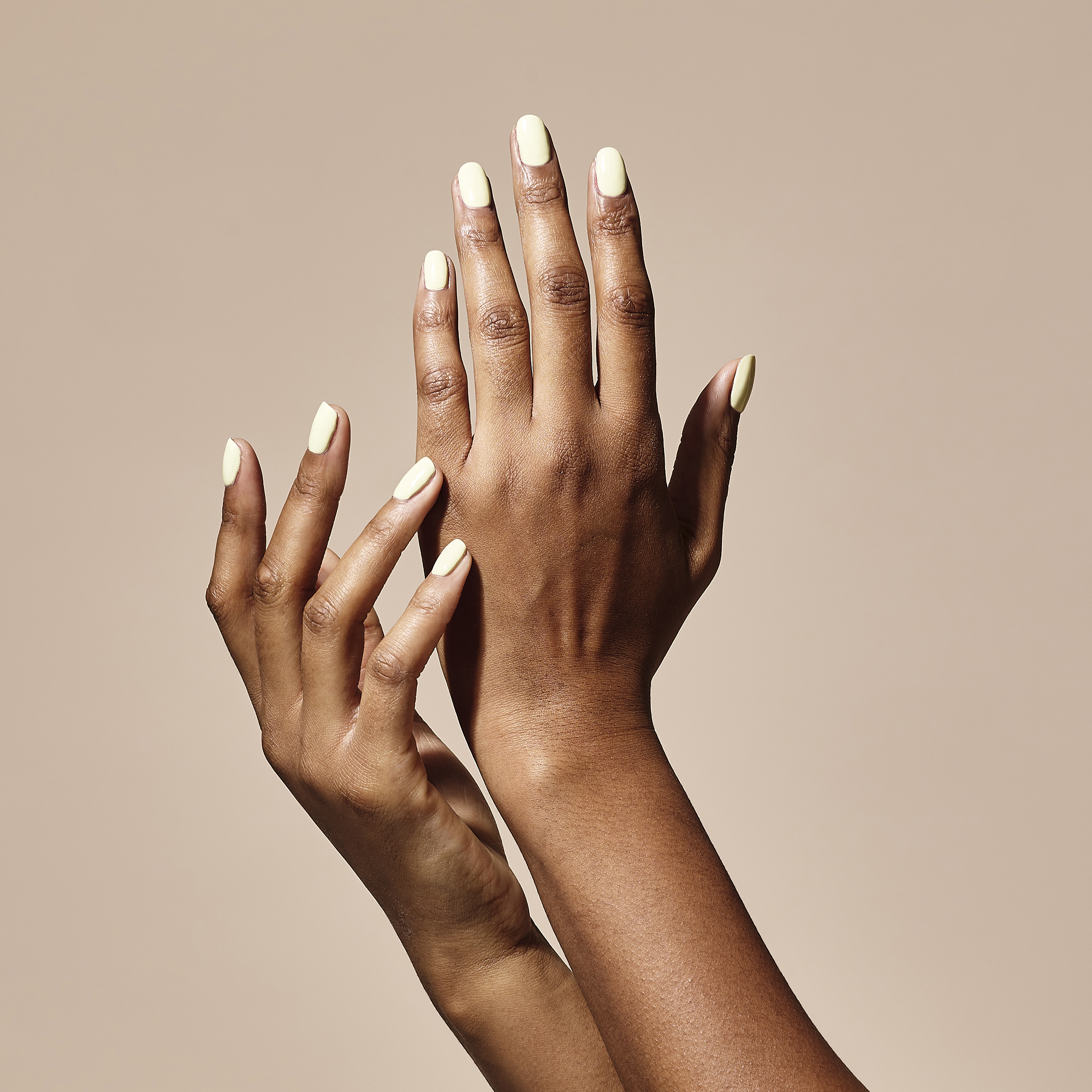 Model wearing Once Upon a Lime Colour Confidence Nail Polish