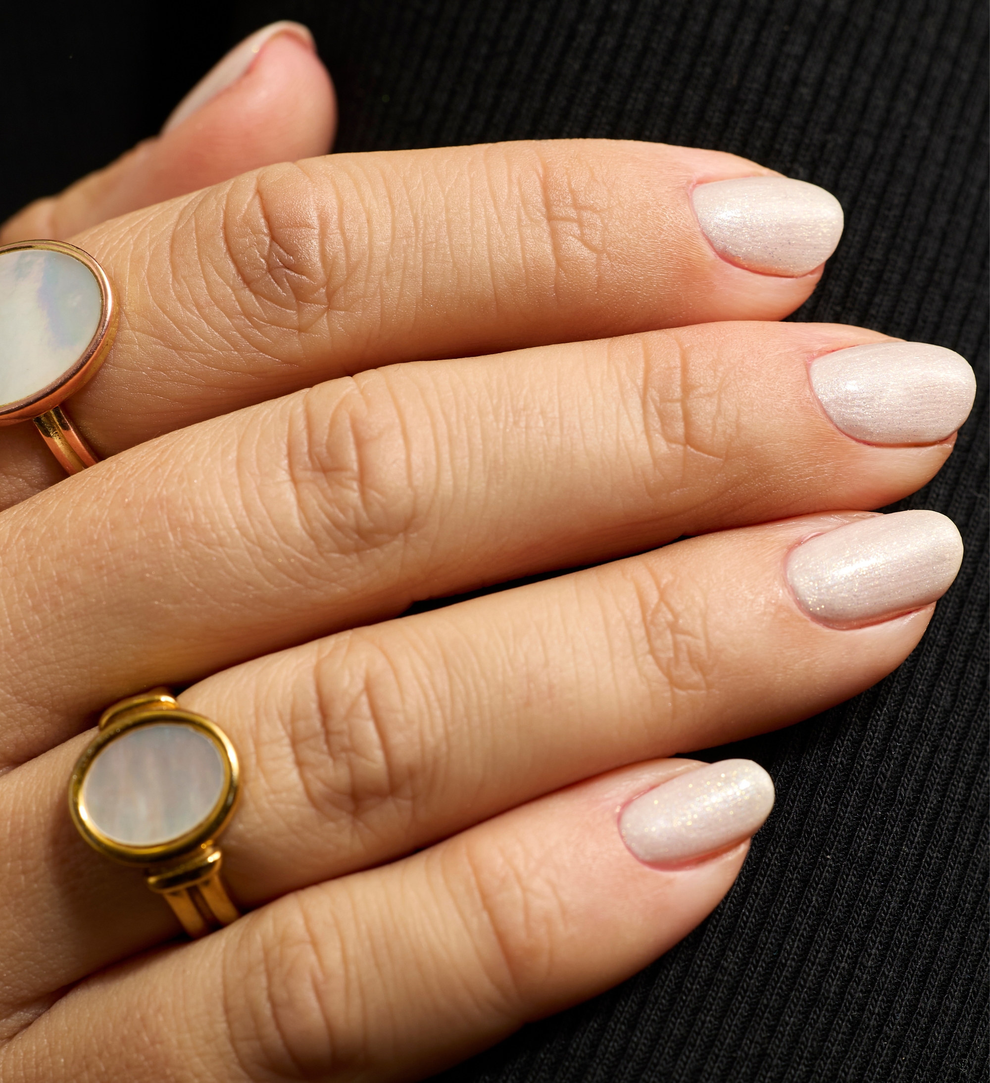 Model wearing White Crystal Colour Confidence Nail Polish