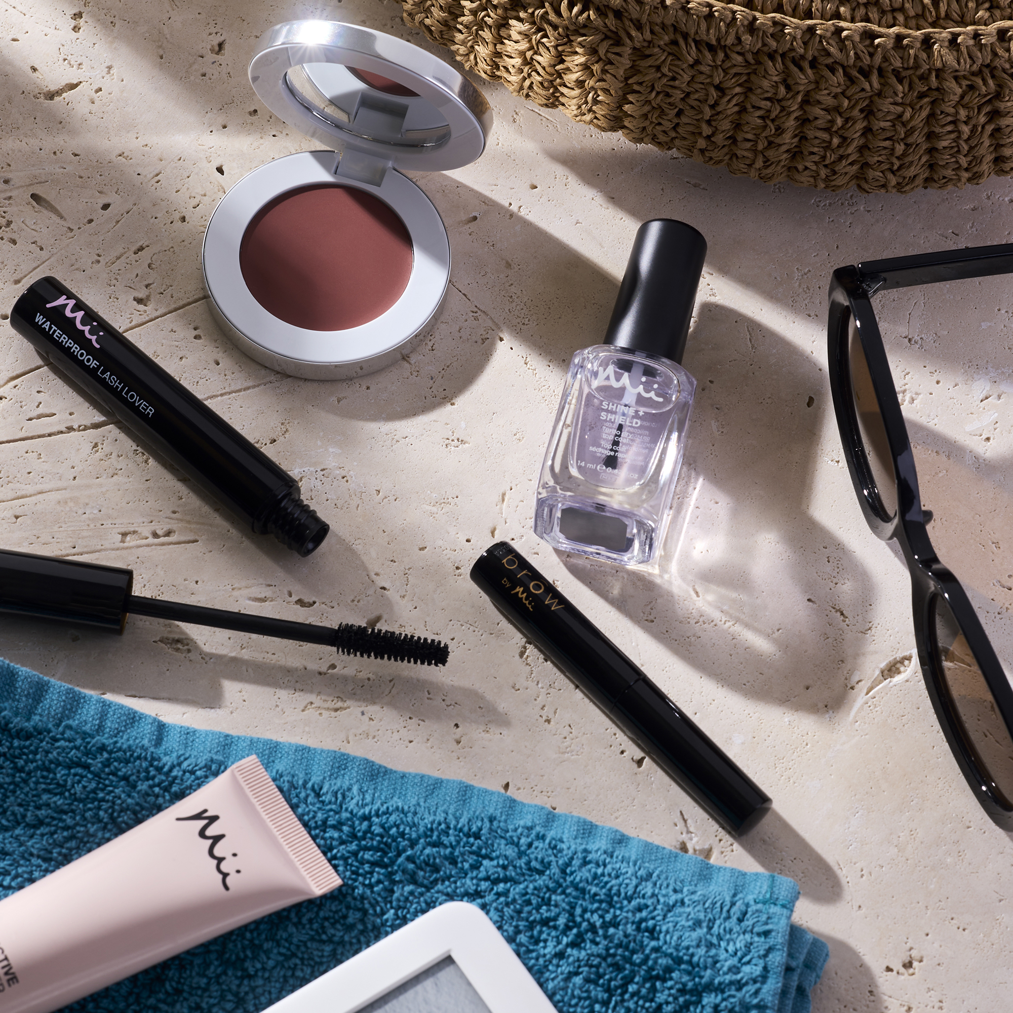 Group shot of Colour Wonder Lip and Cheek Balm, Waterproof Lash Lover ,ascara, Sculpting Brow Builder, Protective Face Primer and Shine + Shield Top Coat