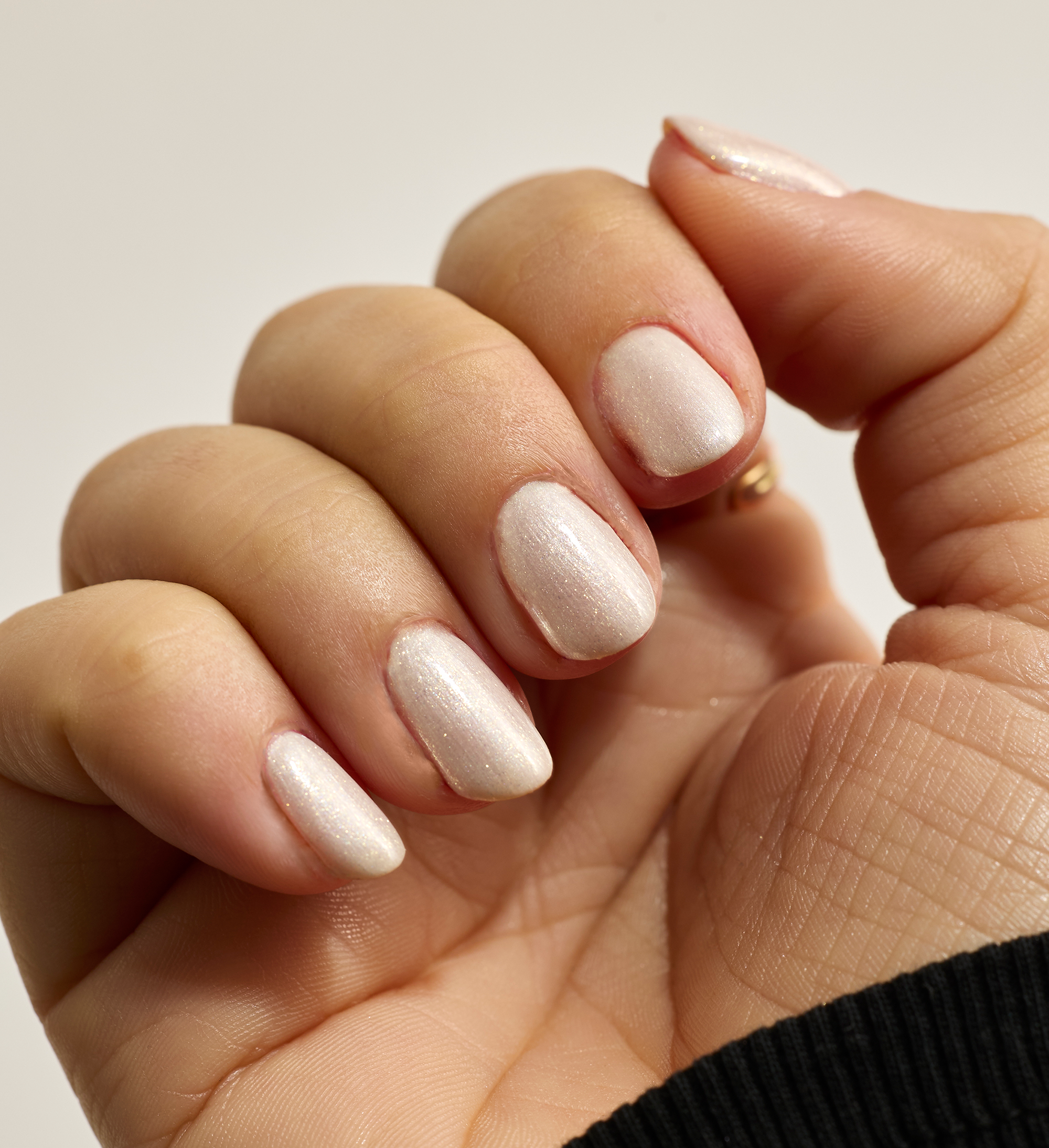 Model wearing White Crystal Colour Confidence Nail Polish