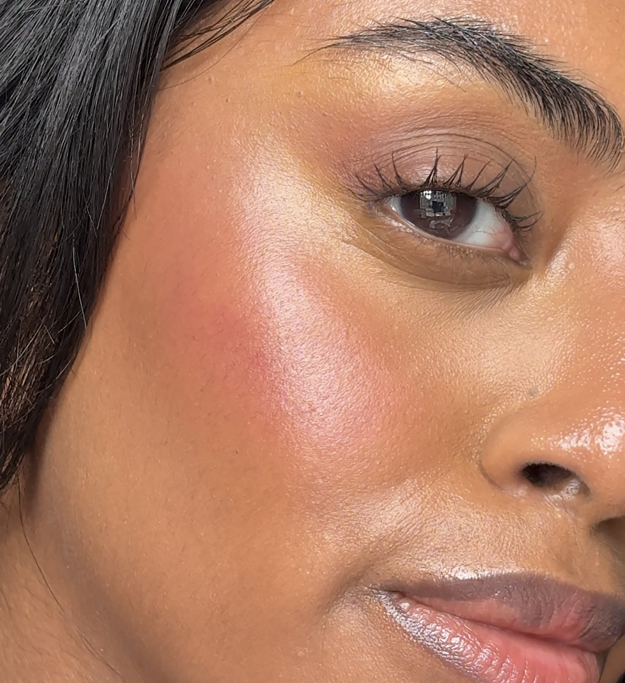 Model wearing Cheek Veil Liquid Blush in Ravishing