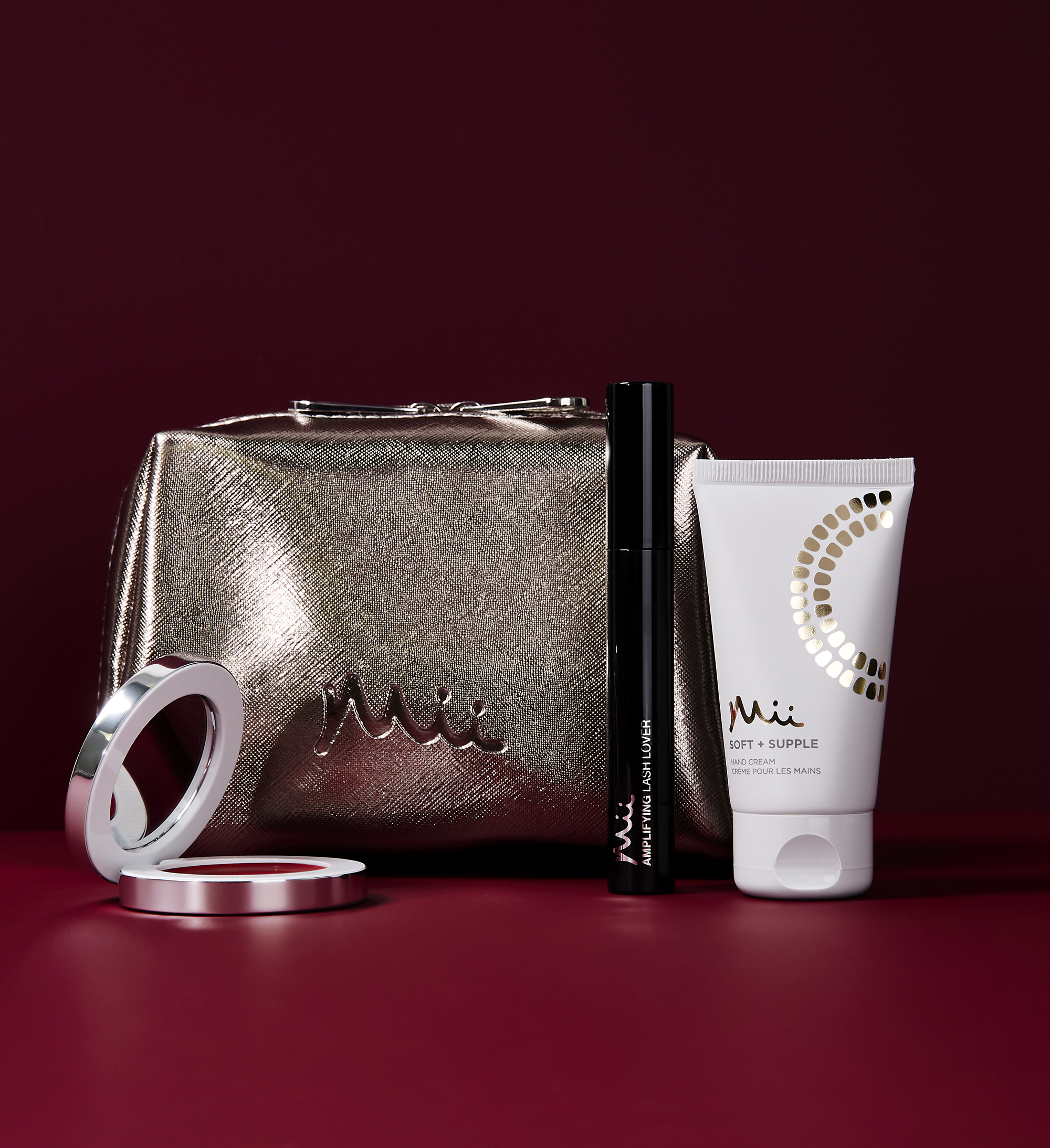 Image of Rose Gold Makeup Bag, Amplifying Lash Lover Mascara, Soft + Supple Hand Cream and Colour Wonder in Rebel Red