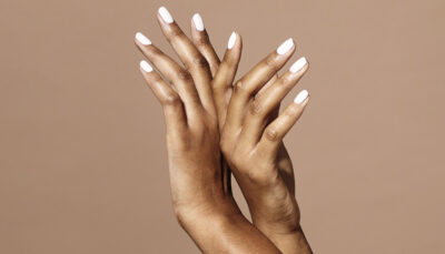 Hand shot of model wearing Colour Confidence Hopeless Romantic nail polish