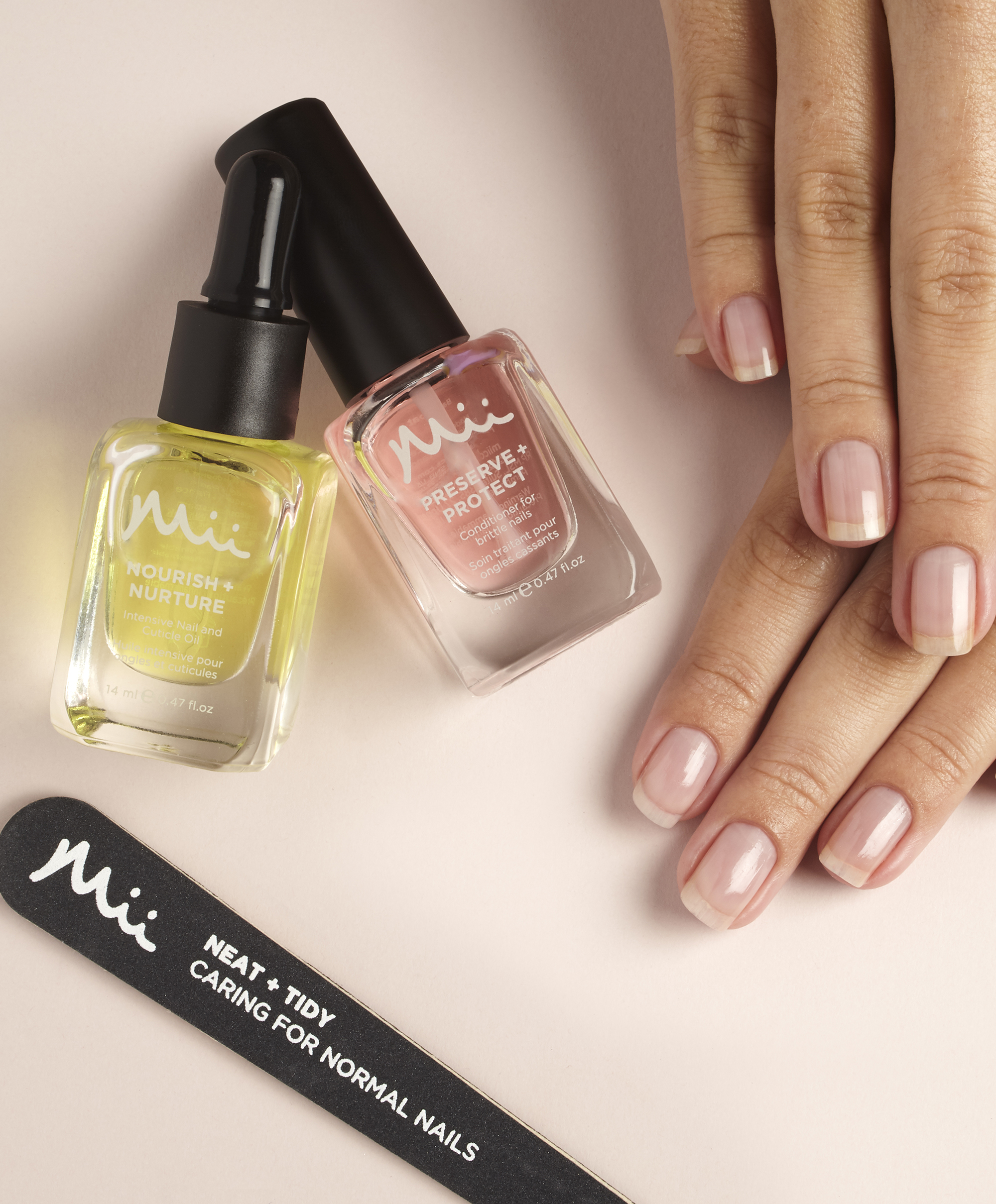 Image of natural nails, Neat+ Tidy Nail File, Nourish + Nurture Nail and Cuticle Oil and Preserve + Protect Base Coat