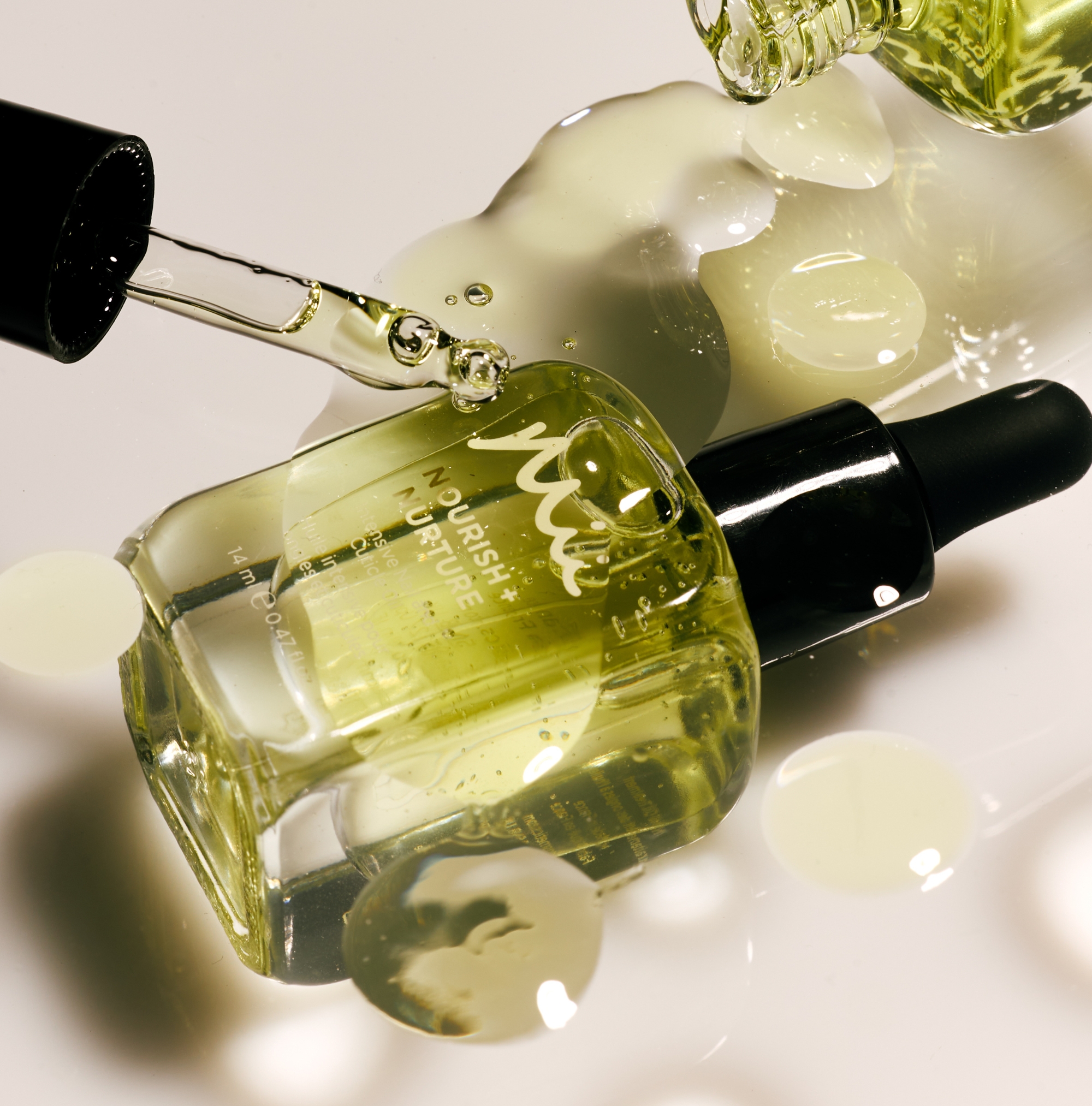 Close up of Nourish + Nurture Nail and Cuticle Oil