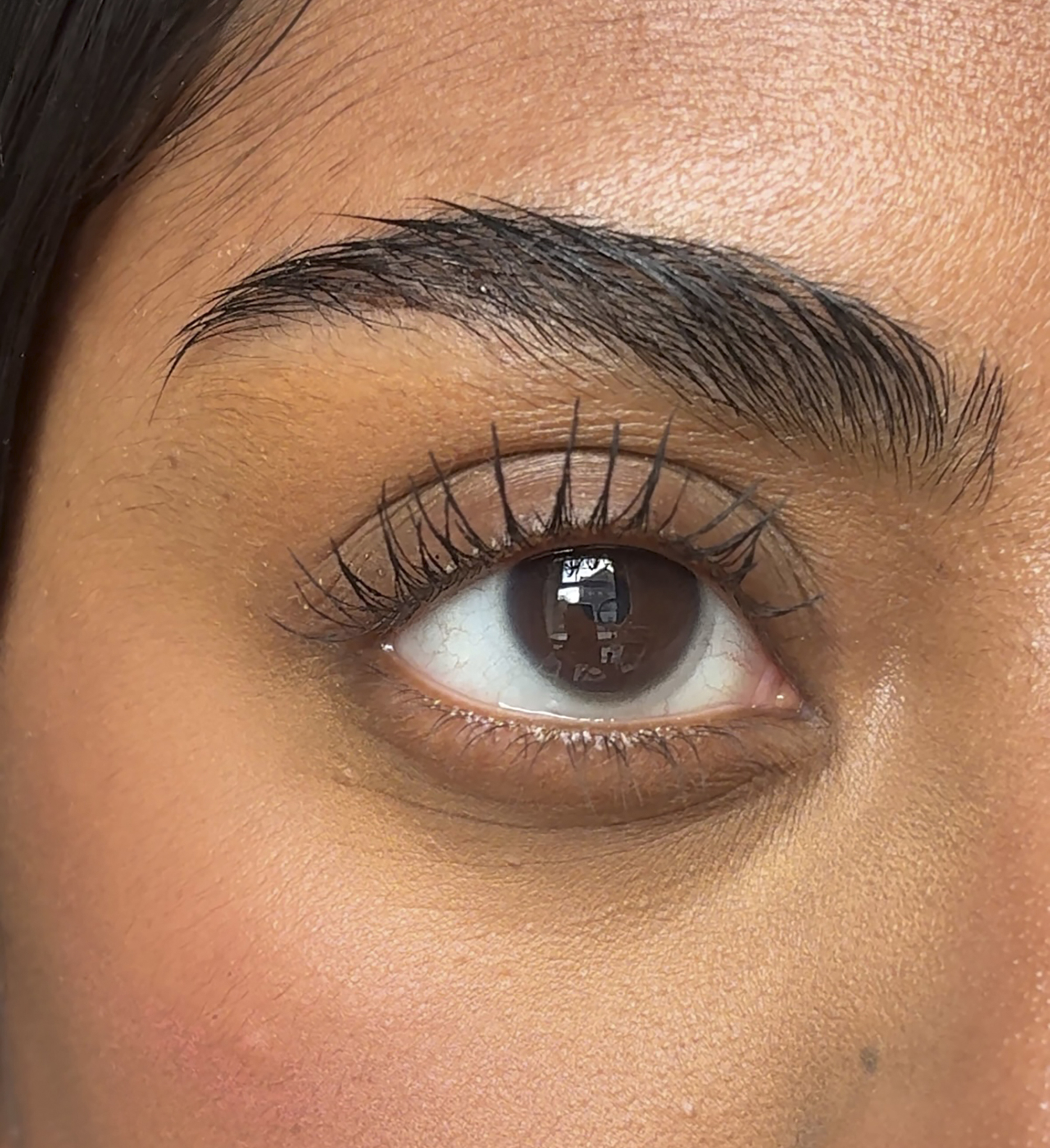 Close up of influencer wearing Amplifying Lash Lover Mascara