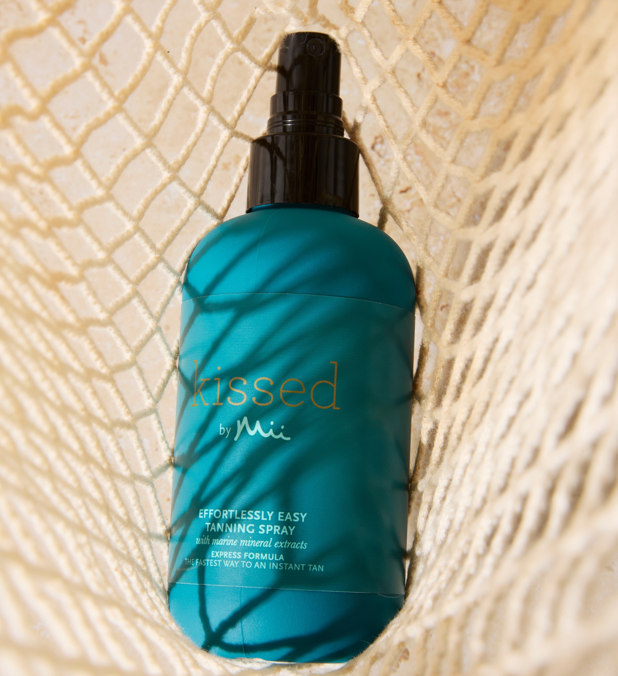 Effortlessly Easy Spray Tan promped on a net bed