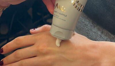 London Fashion Week - nail tech applying Soft + Supple Hand Cream onto models hands
