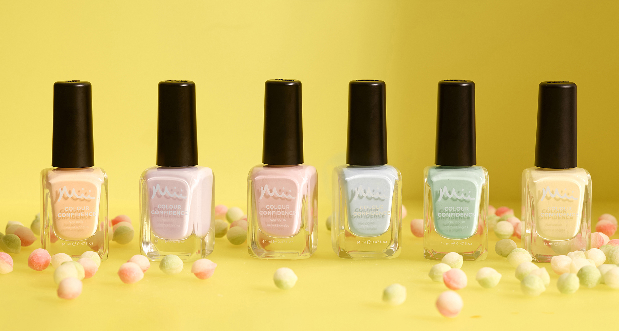 Treat Mii Nail Polish Collection group shot against a yellow background with sweeats around