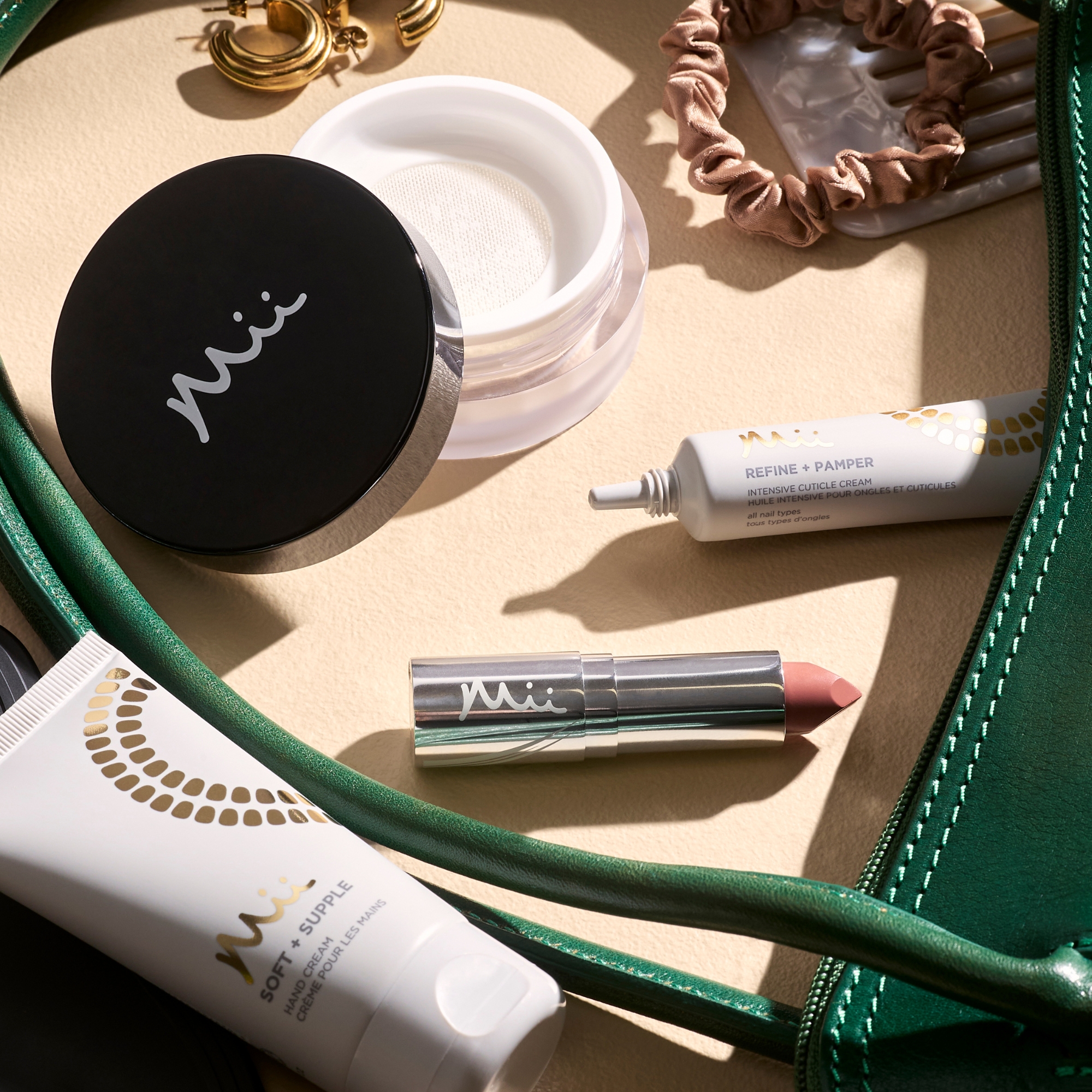 STylised image of Illusionist Translucent Powede, HydraBoost Lip Lover, Refine + Pamper Intensive Cuticle Cream, Soft + Supple Hand Cream