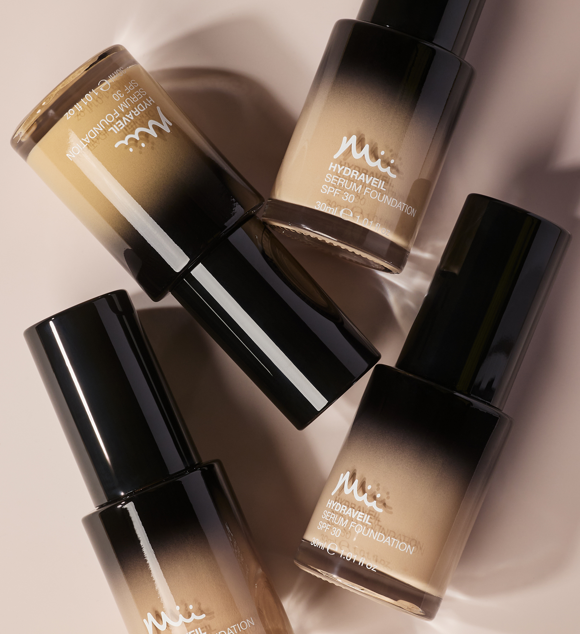 Hydraveil Serum Foundation group shot in shades 1, 2, 3 and 4 against a neutral background