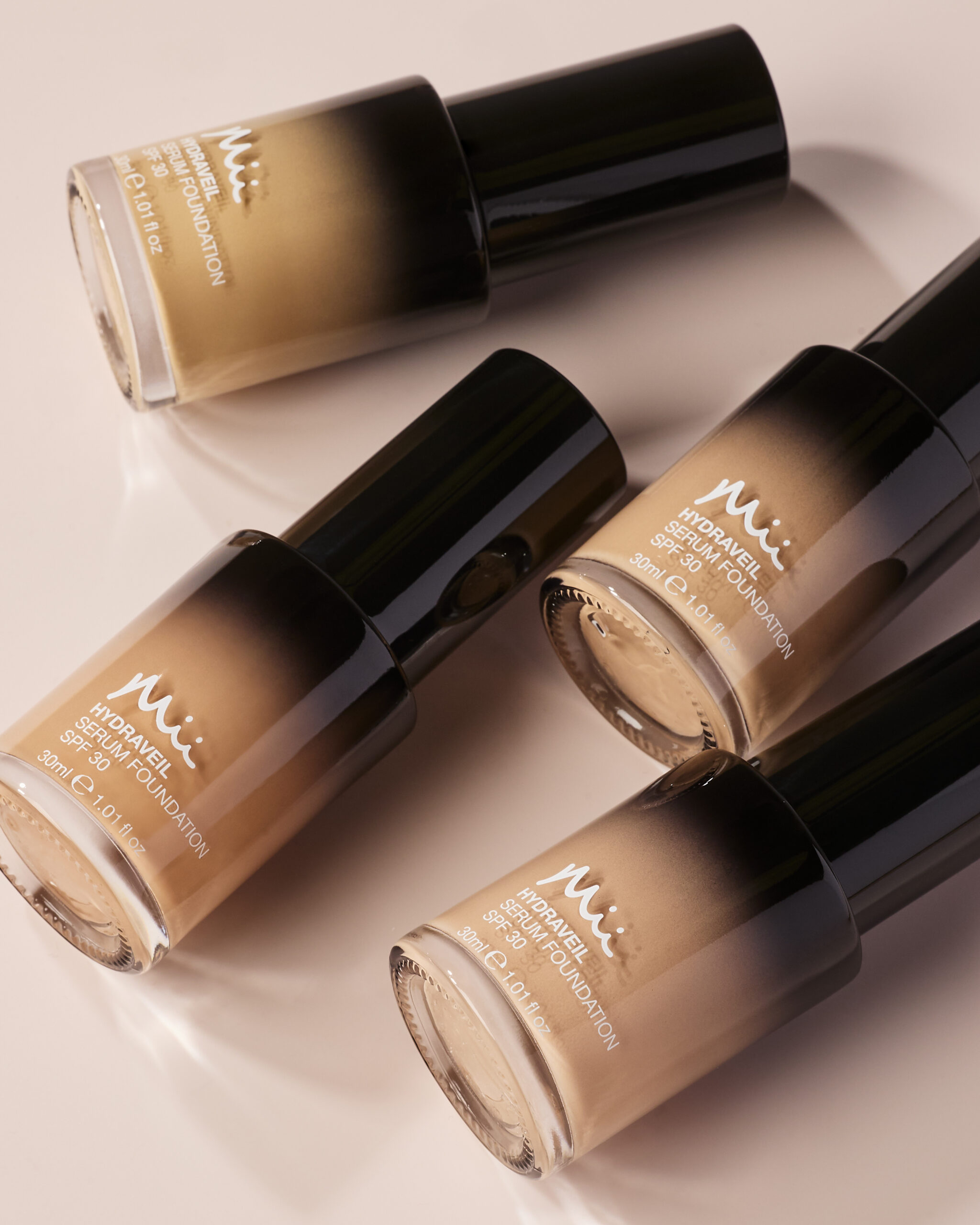 Hydraveil Serum Foundation group shot in shades 6, 7, 10, 11 against a neutral background