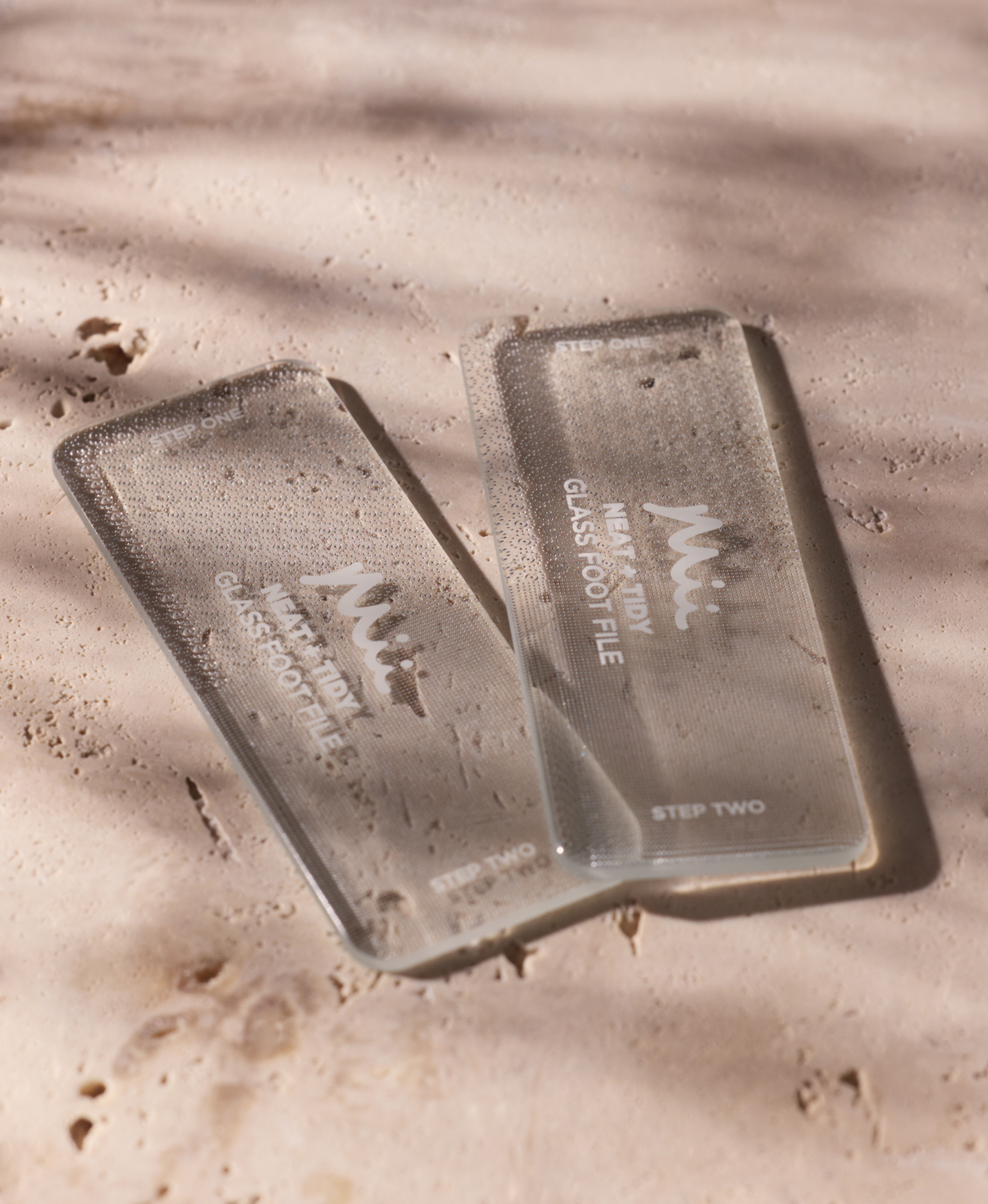 2 Neat + Tidy Glass Foot Files against a neutral background