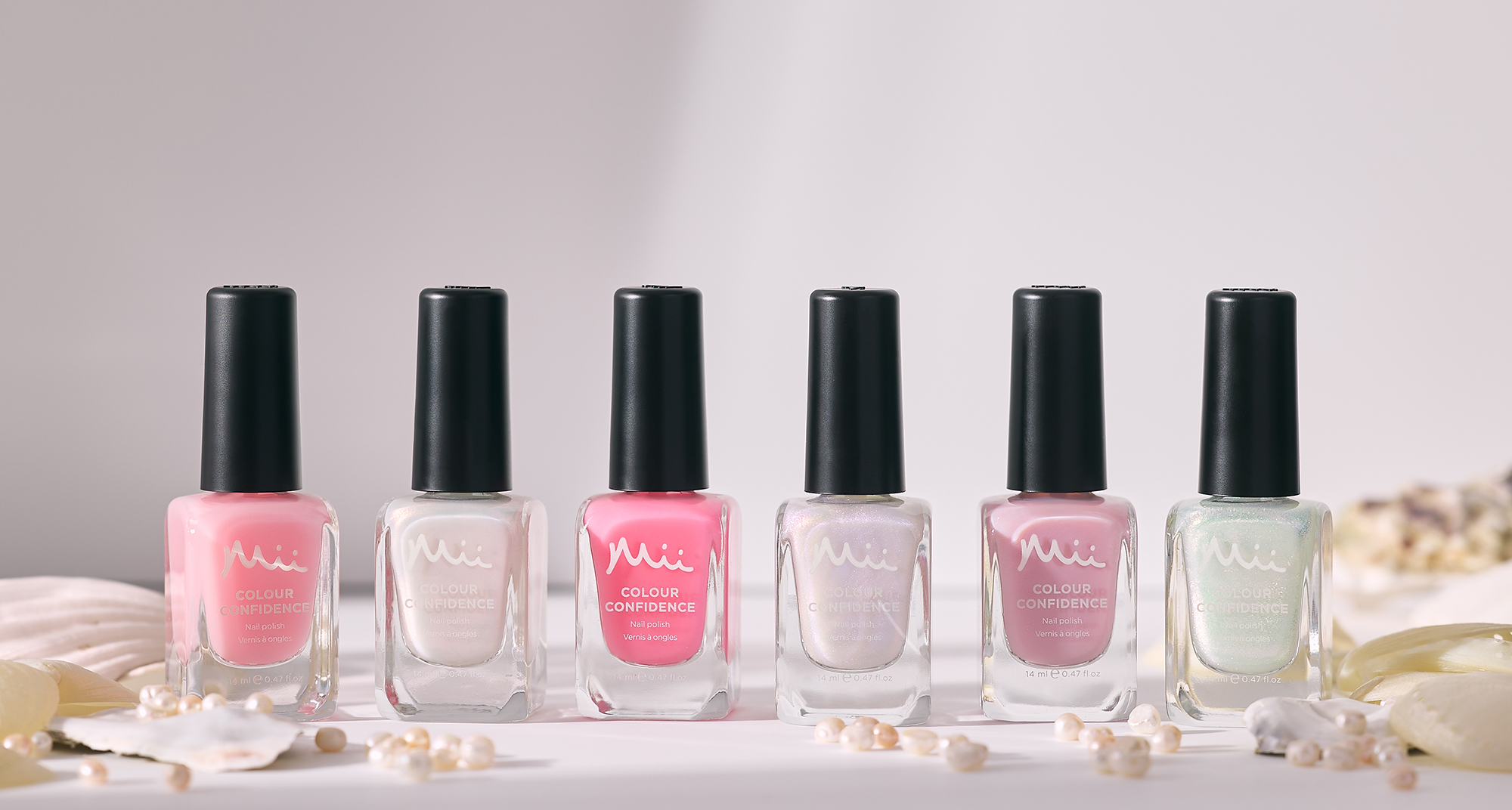 Sheer Seduction Colour Confidence Nail Polish group stylised shot - Colour Confidence Nail Polish in shades Sugar Kiss, Silk Affair, Opal Passion, Barely Blushing, Pinky Promise and Naked Desire